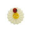 Bouton grosse marguerite avec coccinelle