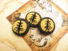 Bouton rond noir et ocre jaune 30mm