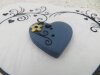 Bouton coeur bleu gris