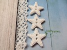 Bouton étoile blanche