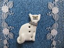 Bouton chat blanc collier gris