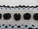 Bouton petite rose noire