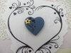 Bouton coeur bleu gris