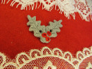 Bouton double feuille de houx grise