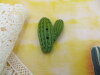 Bouton cactus vert branche droite