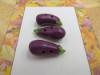 Bouton aubergine