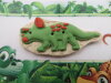 Bouton dinosaure vert