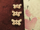 Bouton Papillon beige