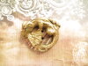 Bouton dragon doré