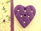 Bouton coeur violet