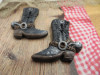 Bouton bottes de cowboy noires