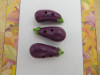 Bouton aubergine