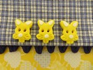 Bouton tête de lapin jaune