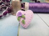 Bouton coeur piqué contour lilas