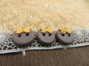 Bouton rond marron noeud or