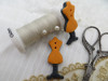 Bouton mannequin couture orange