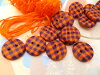 Bouton rond motif tarten orange violet