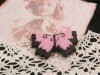 Bouton gros papillon noir et rose