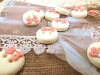 Bouton rond blanc noeud rose
