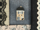 Bouton petite maison beige et noir